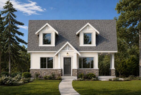 Two-story DADU with gray roof, white exterior, stone accents, and large windows designed in a DADU floor plan. A curved walkway leads to the front door. The house is surrounded by green grass, shrubs, and tall trees under a blue sky.